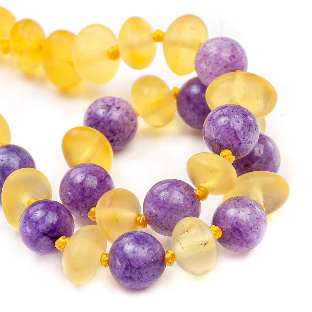 Детские бусы из янтаря и кварца