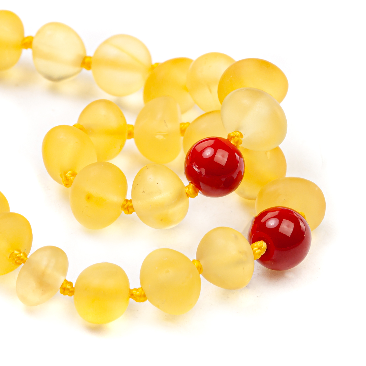 Детские бусы из янтаря и коралла